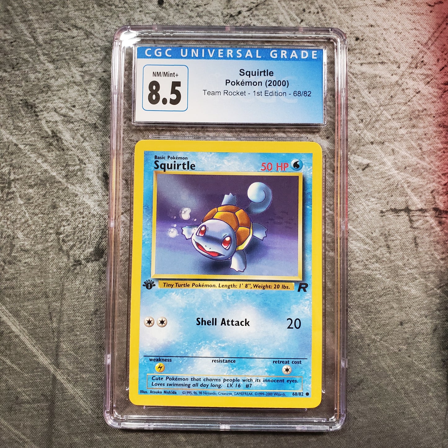 CGC 8.5 Squirtle 68/82 Pokémon Team Rocket 1st Edition