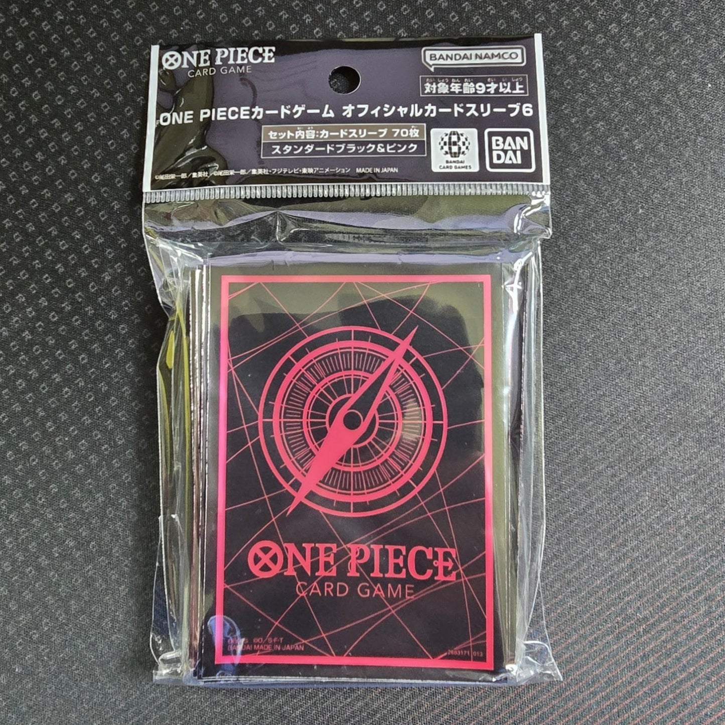 Official One Piece sleeve packs with 70 sleeves each. Black and Pink Design.