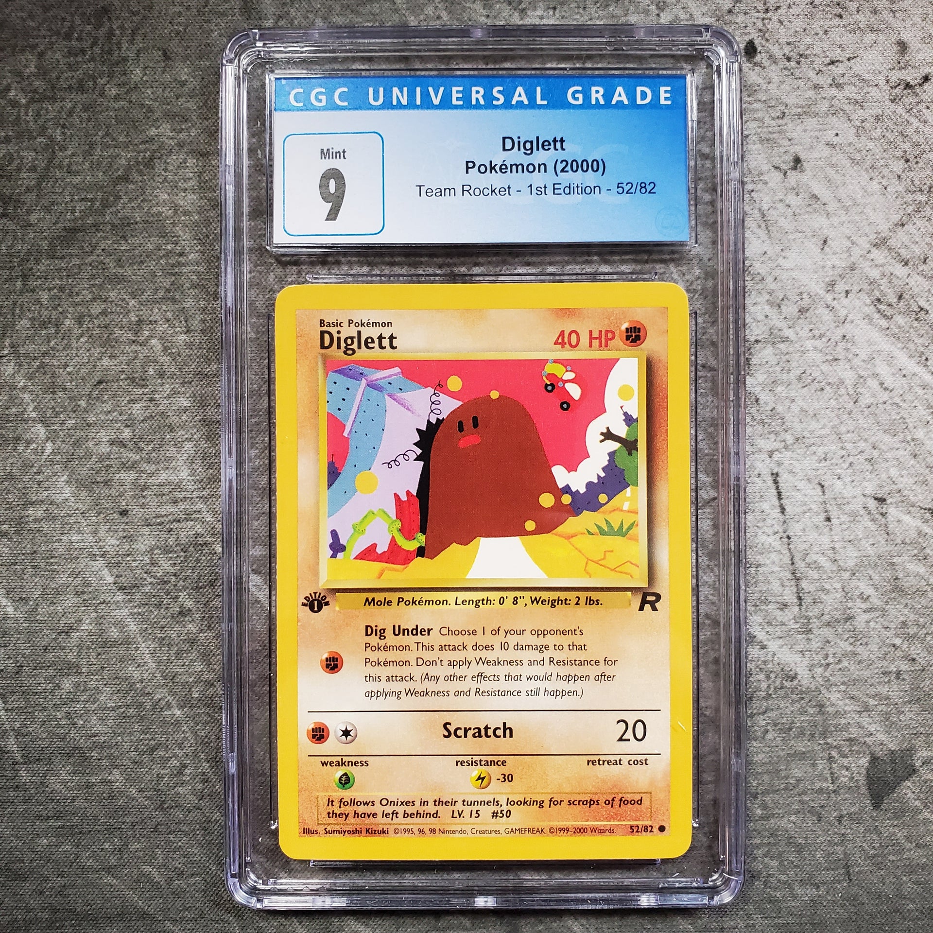 CGC 9 Diglett 52/82 Pokmon Team Rocket 1st Edition CGC 9 Diglett 52/82 Pokmon Team Rocket 1st Edition
